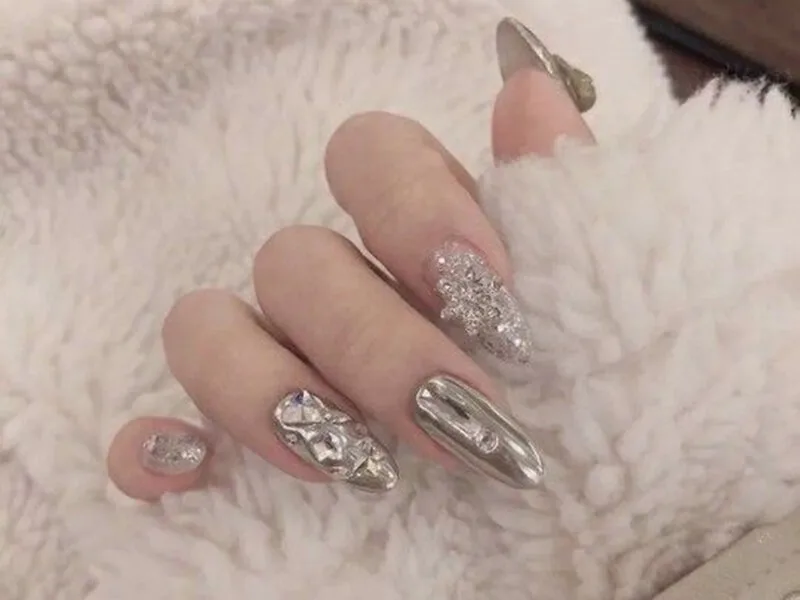 Embrace the festive spirit with sparkling New Year's nails.