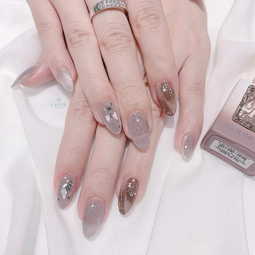 Shine bright like a diamond with shimmering nail art.