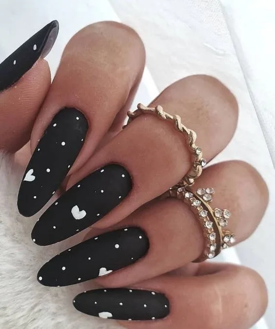 Classic Elegance: Make a Statement with Stylish Black Spherical Nails